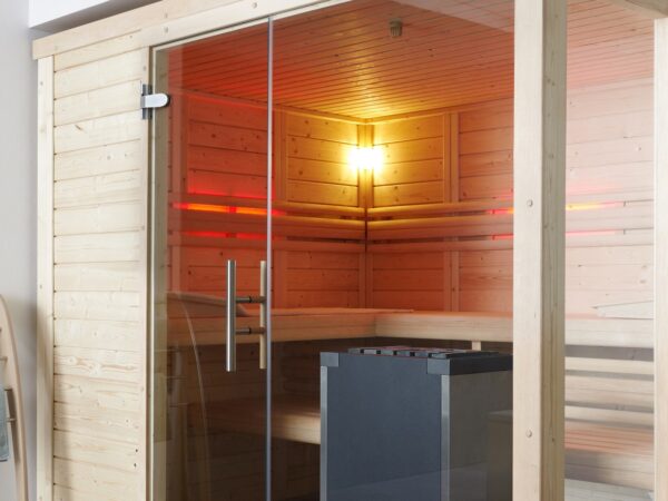 premium innensauna daniel massivholz, innensauna kaufen deutschland, blockbohlen sauna 45 mm, heimsauna polarfichte innenraum, sauna mit glastür innenbereich, massivholz sauna wohnraum